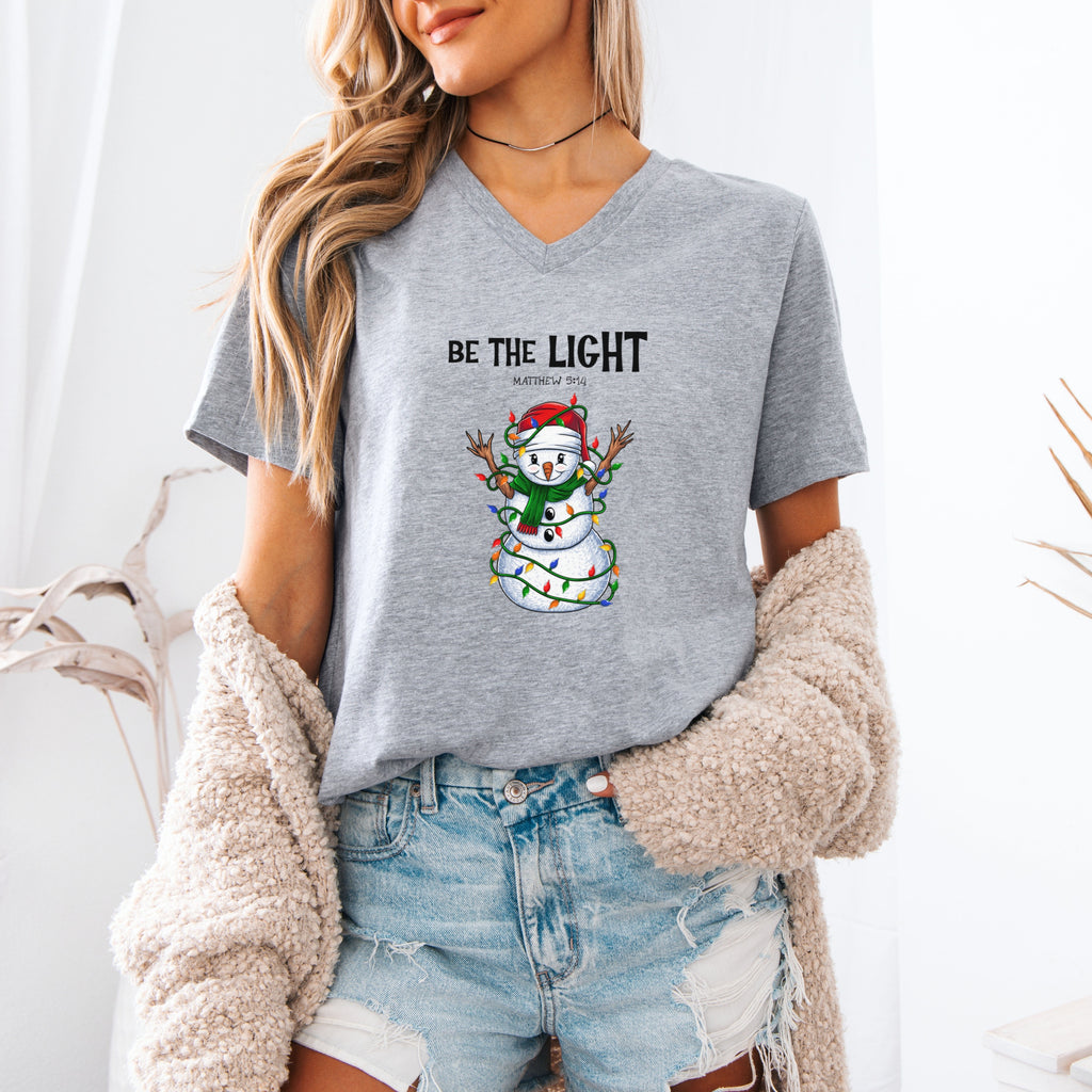 Be The Light Snowman Tee | Christmas Snowman with Holiday Lights
