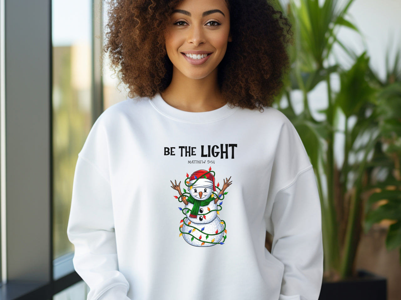 Be The Light Snowman Christmas Sweatshirt — Snowman with String Lights