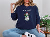 Be The Light Snowman Christmas Sweatshirt — Snowman with String Lights