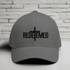 Redeemed Embroidered Flexfit Hat with a cross design, representing faith and style.
