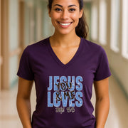 Jesus Loves You & Me T-shirt featuring a woman in a V-neck tee with John 15:13 design.