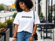 Jesus Loves Me Unisex T-shirt worn by a woman outdoors, showcasing faith graphic design and relaxed fit.