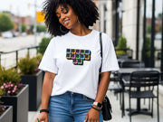Jesus Loves Me Unisex T-Shirt featuring keyboard keys graphic on a stylish model outdoors