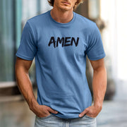 Amen Brush Stroke Text T-Shirt displayed on a model in a blue color, featuring bold brush-stroke style 'AMEN' text.