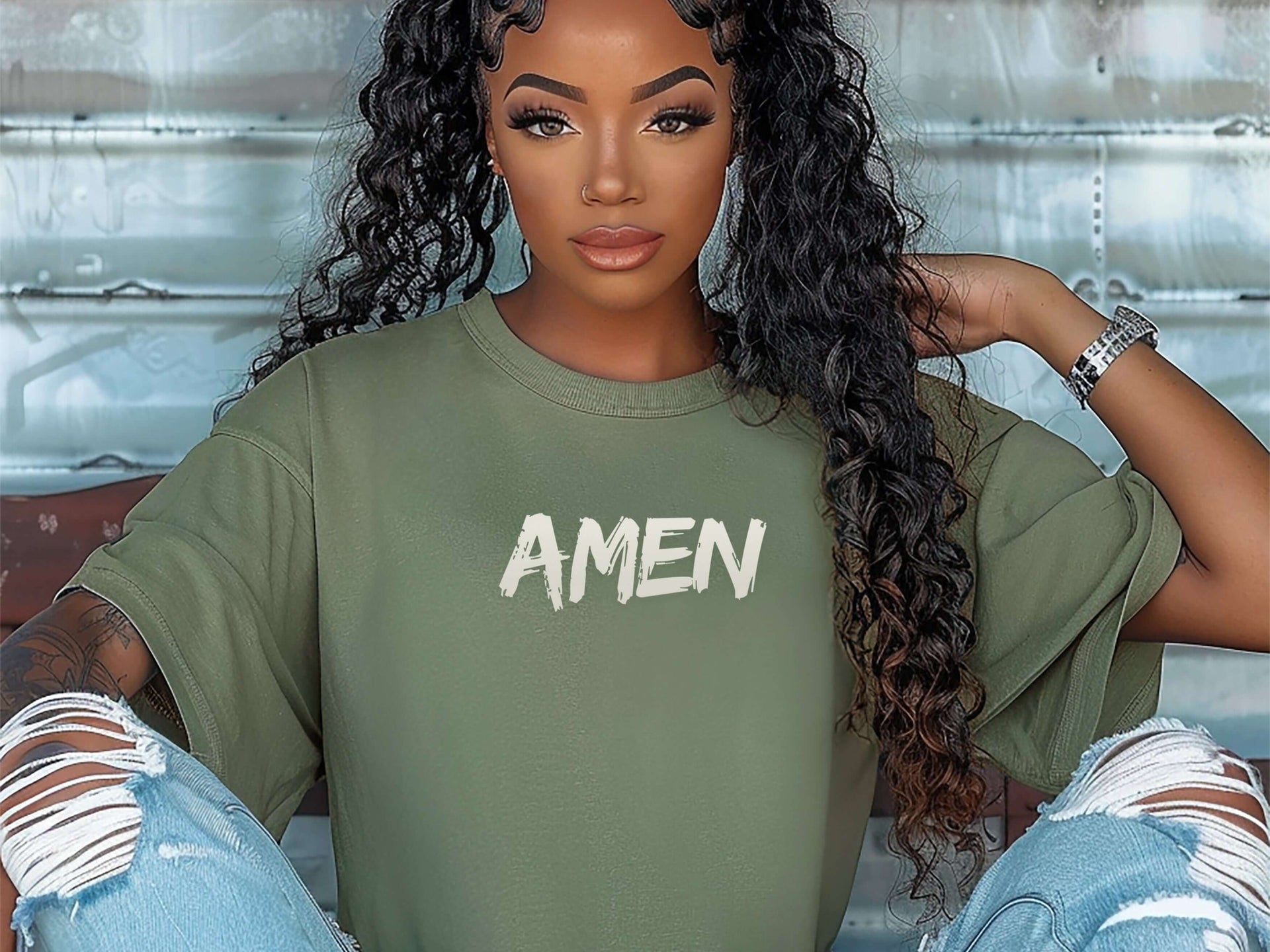 Amen Brush Stroke Unisex T-shirt worn by a model in an moss color with a relaxed fit and bold design.