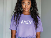 Amen Brush Stroke Unisex T-shirt in lavender worn by a smiling woman with long hair and hoop earrings.