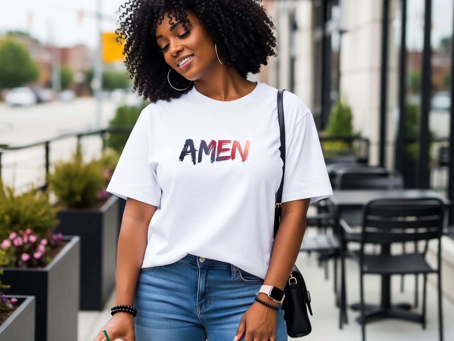 Amen Brush Stroke Unisex T-shirt worn by a woman with curly hair, showcasing bold text on a casual white tee.
