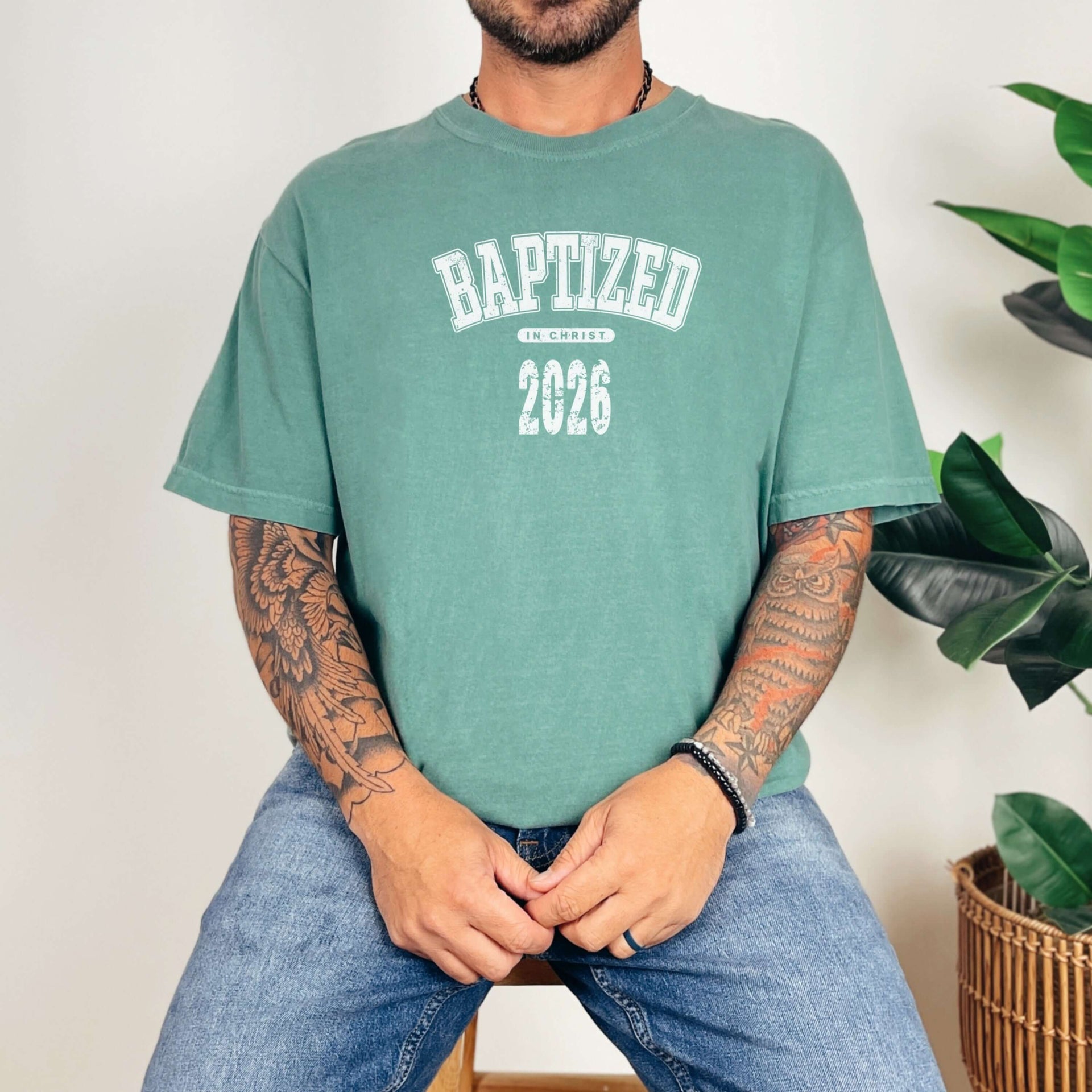 Baptized 2026 T-Shirt worn by a man, showcasing its comfort and style, perfect for celebrating baptism.