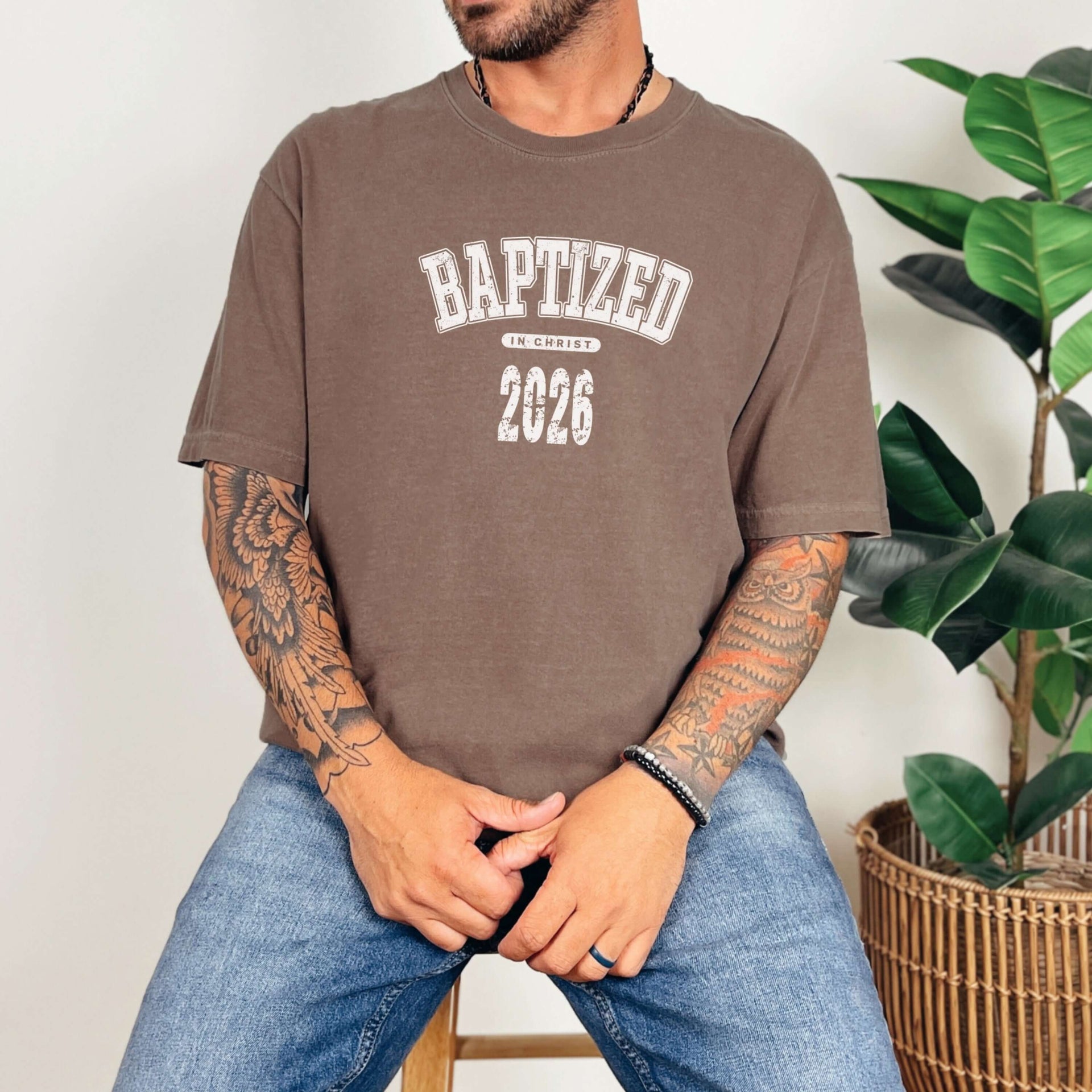Baptized 2026 T-Shirt worn by a person, showcasing a stylish design for new believers celebrating their baptism.