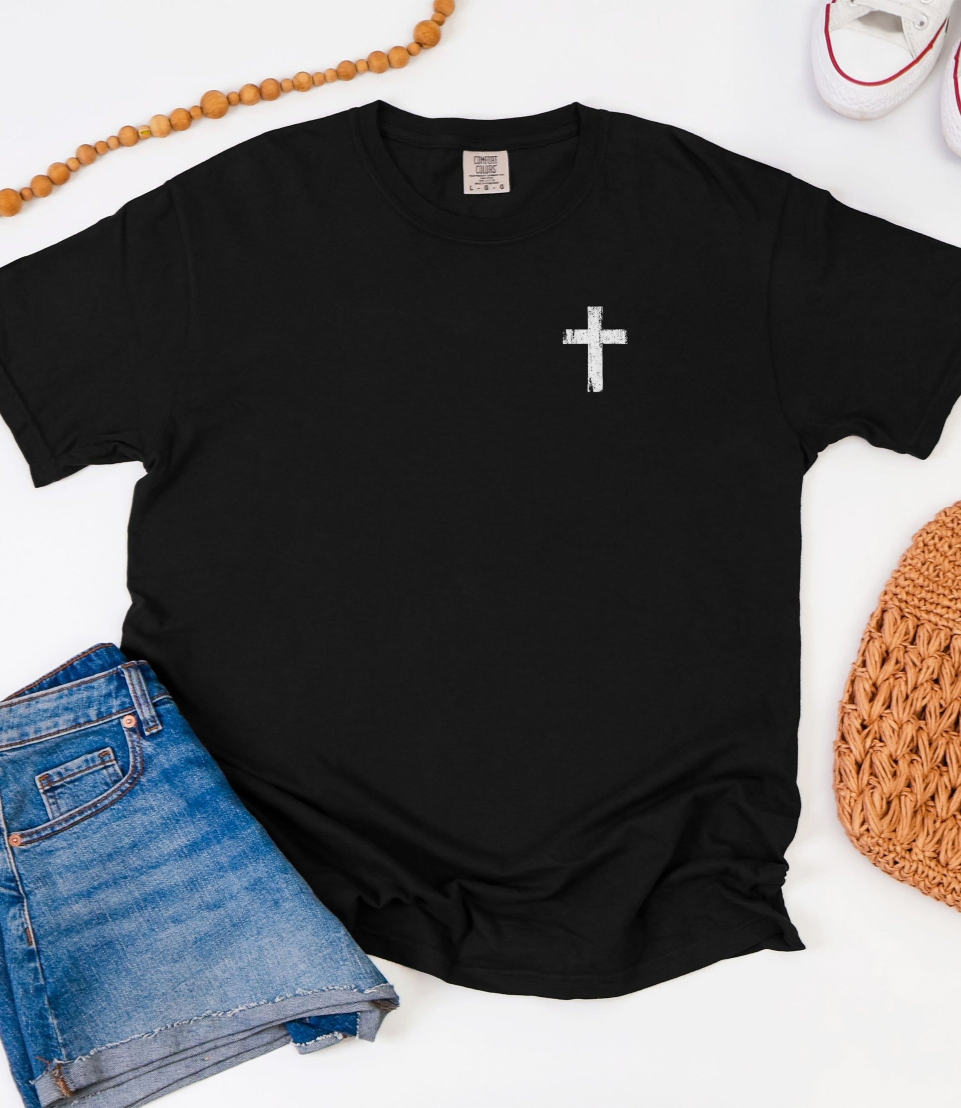 God Has Your Back T-Shirt featuring a color block cross design on the front left chest area.