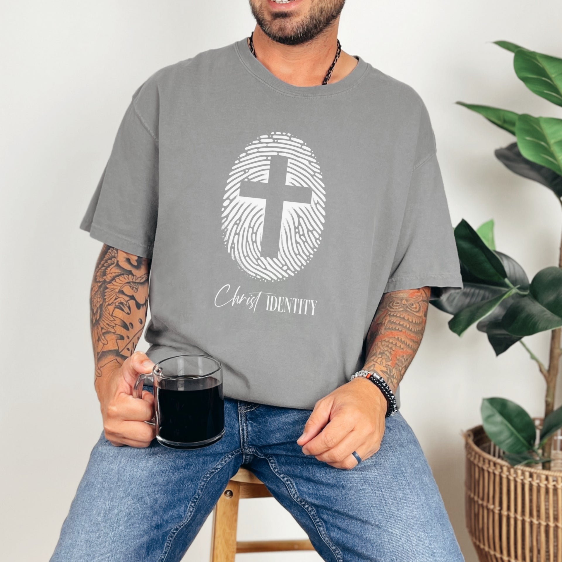 Cross Fingerprint Identity Unisex T-shirt featuring a bold fingerprint cross graphic on a grey t-shirt.