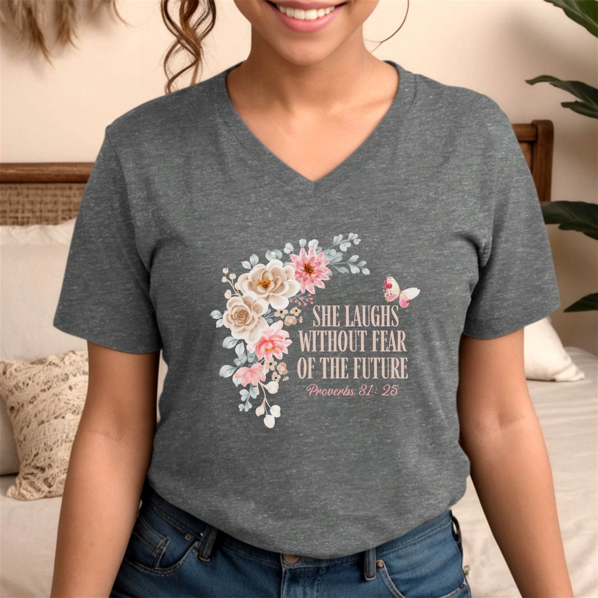 She Laughs Without Fear Of The Future V Neck Tee with floral design and Proverbs 31:25.