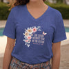 She Laughs Without Fear Of The Future V Neck Tee with floral design and inspirational message.