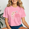 She Laughs Without Fear Of The Future Crop Tee in pink with floral design, embodying strength and confidence.