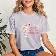 She Laughs Without Fear Of The Future Crop Tee with floral design, perfect for empowering women's fashion.