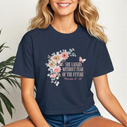 Model wearing She Laughs Without Fear Of The Future Crop Tee with floral design and Proverbs 31:25.