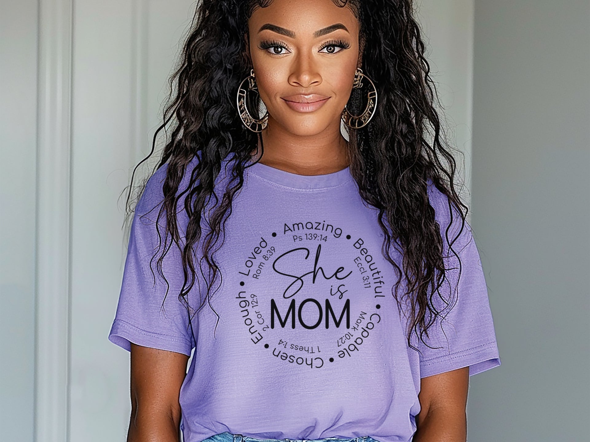 Girl wearing She Is Mom Circle Script T Shirt with a positive message design.