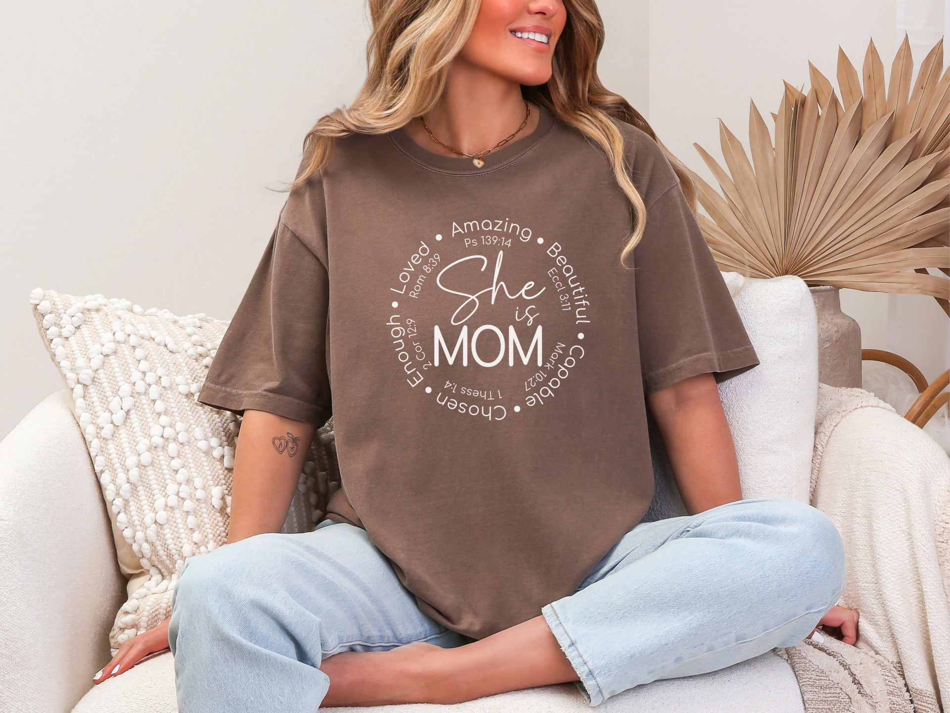 She Is Mom Circle Script T Shirt displayed on a model, showcasing the soft circular design and comfortable fit.