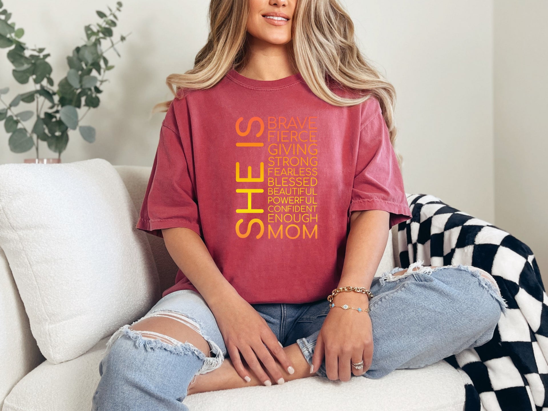 SHE IS vertical affirmation mom T-Shirt worn by a woman, featuring positive affirmations and a comfortable fit.