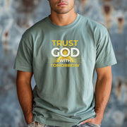 Trust God With Tomorrow T-Shirt worn by a model, showcasing its encouraging design and comfortable style.
