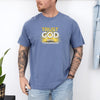 Trust God With Tomorrow T-Shirt modeled by a man with tattoos, featuring a bright design on a blue t-shirt.
