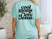 Cool Moms Love Jesus T Shirt displayed from the back, featuring stylish text design on a chalky mint fabric.