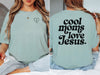 Cool Moms Love Jesus T Shirt featuring heart line art design and bold text on a bay tee.