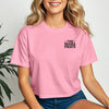 This Mama Prays Christian Crop Tee for Moms in pink worn by a smiling woman, perfect for casual faith-inspired outfits.