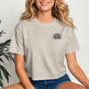 This Mama Prays Christian Crop Tee for Moms in a casual setting, perfect for stylish moms of faith.