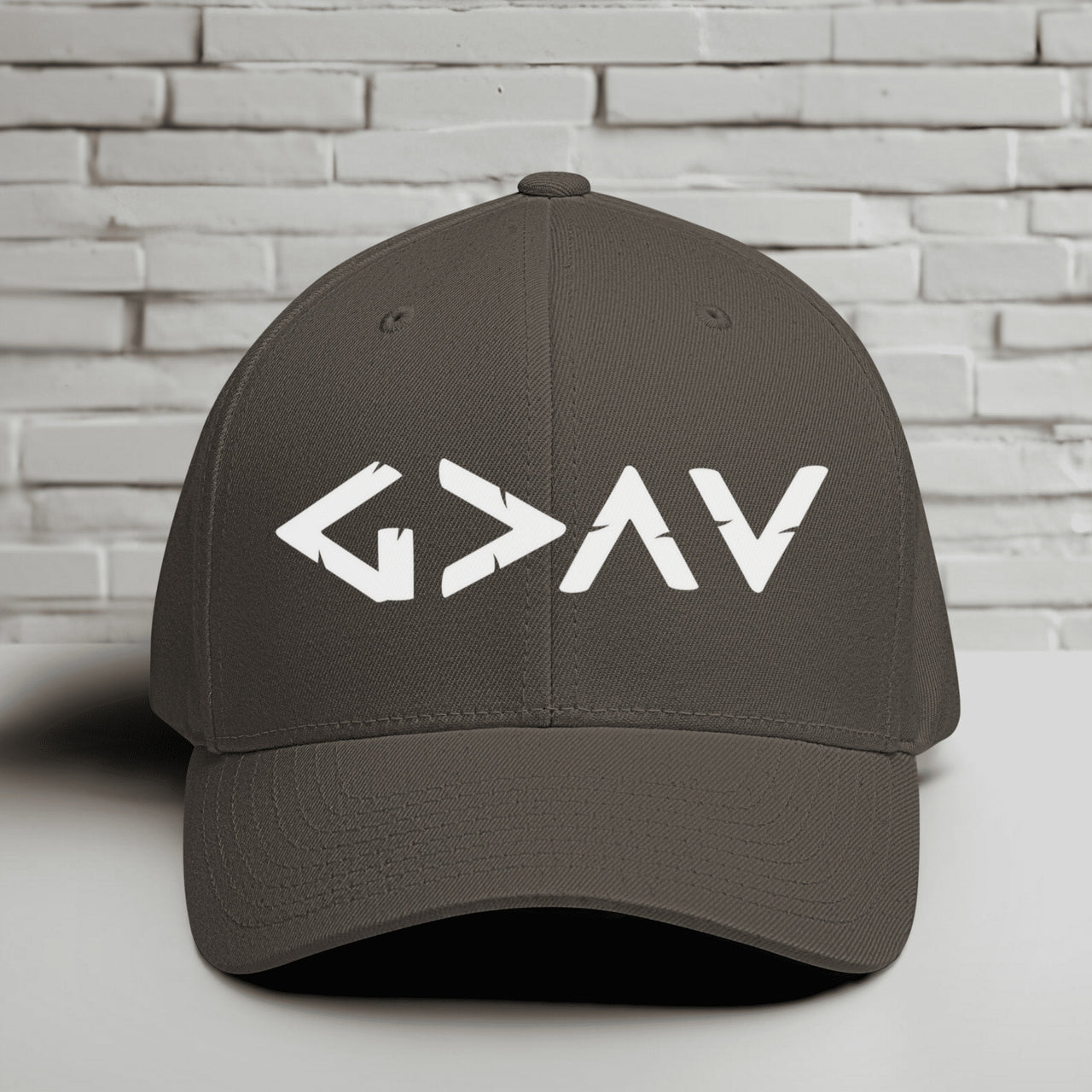 God is Greater than the Highs and Lows Embroidered Flexfit Hat