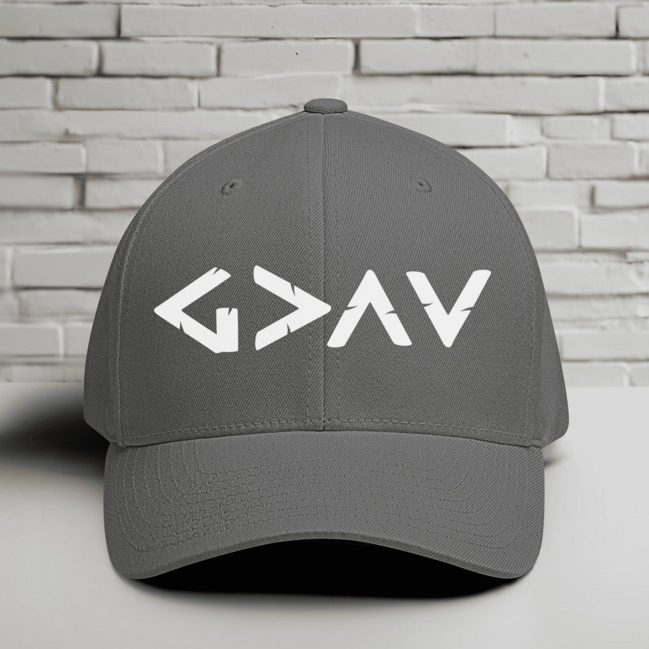 God is Greater than the Highs and Lows Embroidered Flexfit Hat