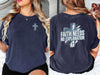 Model wearing a navy blue Faith Needs No Explanation T-Shirt with a cross design, showcasing faith and style.