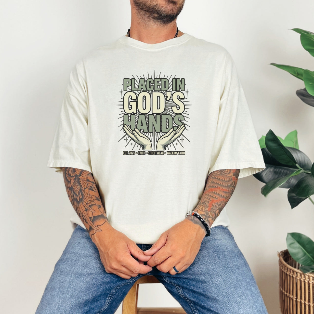 Placed in God's Hands T-Shirt featuring a powerful graphic message, perfect for those who trust in God.