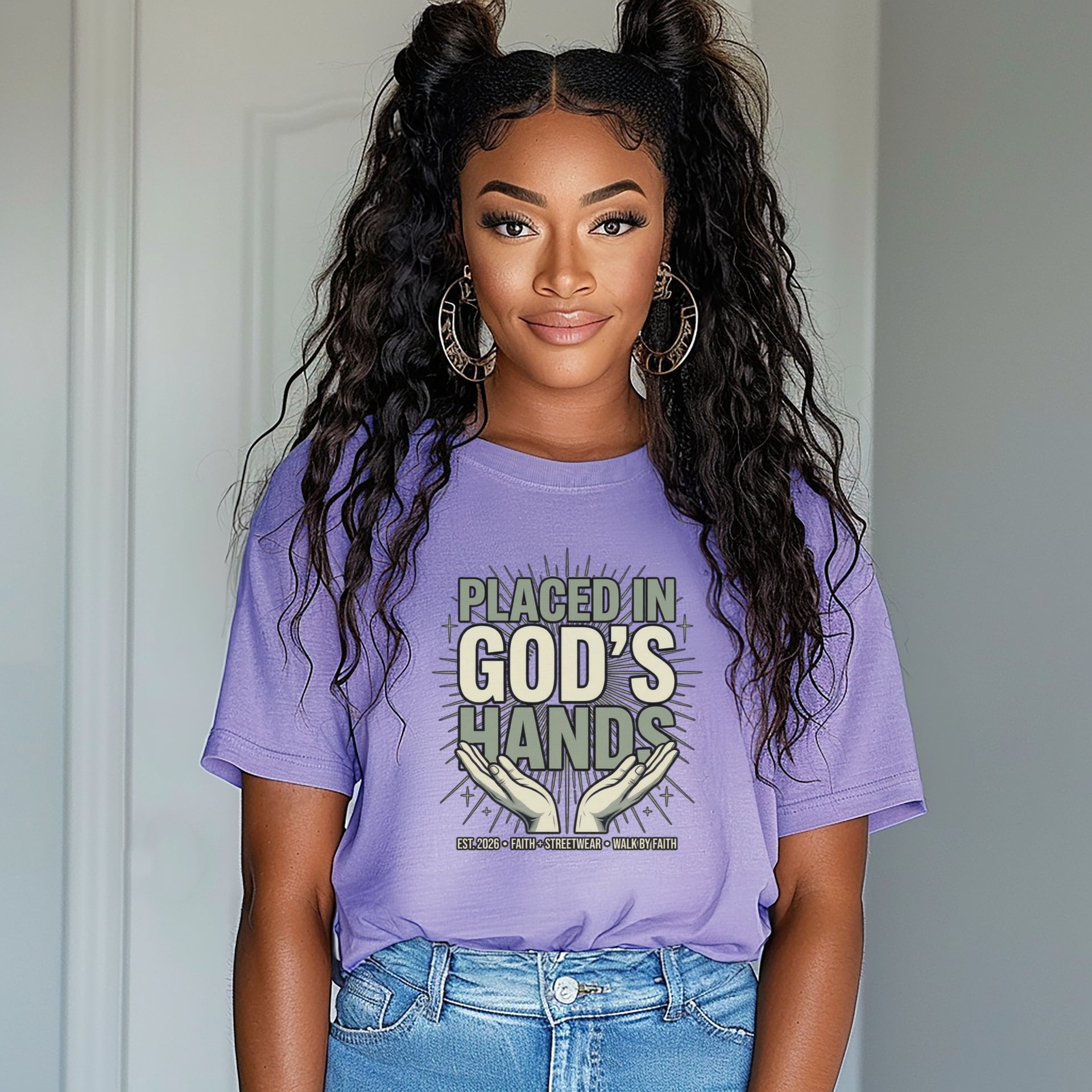 A woman wearing a violet Placed in God's Hands T-Shirt with hands graphic, promoting trust in God.
