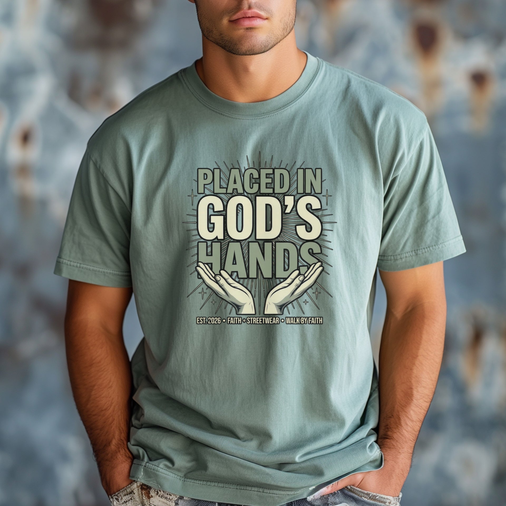 Model wearing Placed in God's Hands T-Shirt featuring hands graphic, symbolizing faith and trust in God.