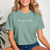 Woman Of Faith Crop Tee displayed on a model, showcasing a trendy cropped fit and minimalist design.