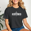 Redeemed Cross Graphic Crop Tee featuring a stylish cross design and trendy cropped fit on a model.