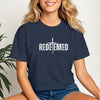 Model wearing a Redeemed Cross Graphic Crop Tee, showcasing a meaningful cross design in stylish cropped fit.