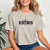 Redeemed Cross Graphic Crop Tee featuring a stylish design in soft fabric, perfect for everyday wear and expressing faith.