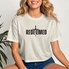 Redeemed Cross Graphic Crop Tee featuring a bold 'REDEEMED' design on a trendy cropped t-shirt.