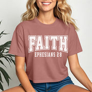Faith Ephesians 2 8 Crop Tee in pink, featuring bold text, ideal for casual wear and expressing faith.
