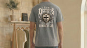 I Fight Demons Armor Of God Ephesians 6-11 Comfort Colors T Shirt displayed on a model's back in a cozy setting.