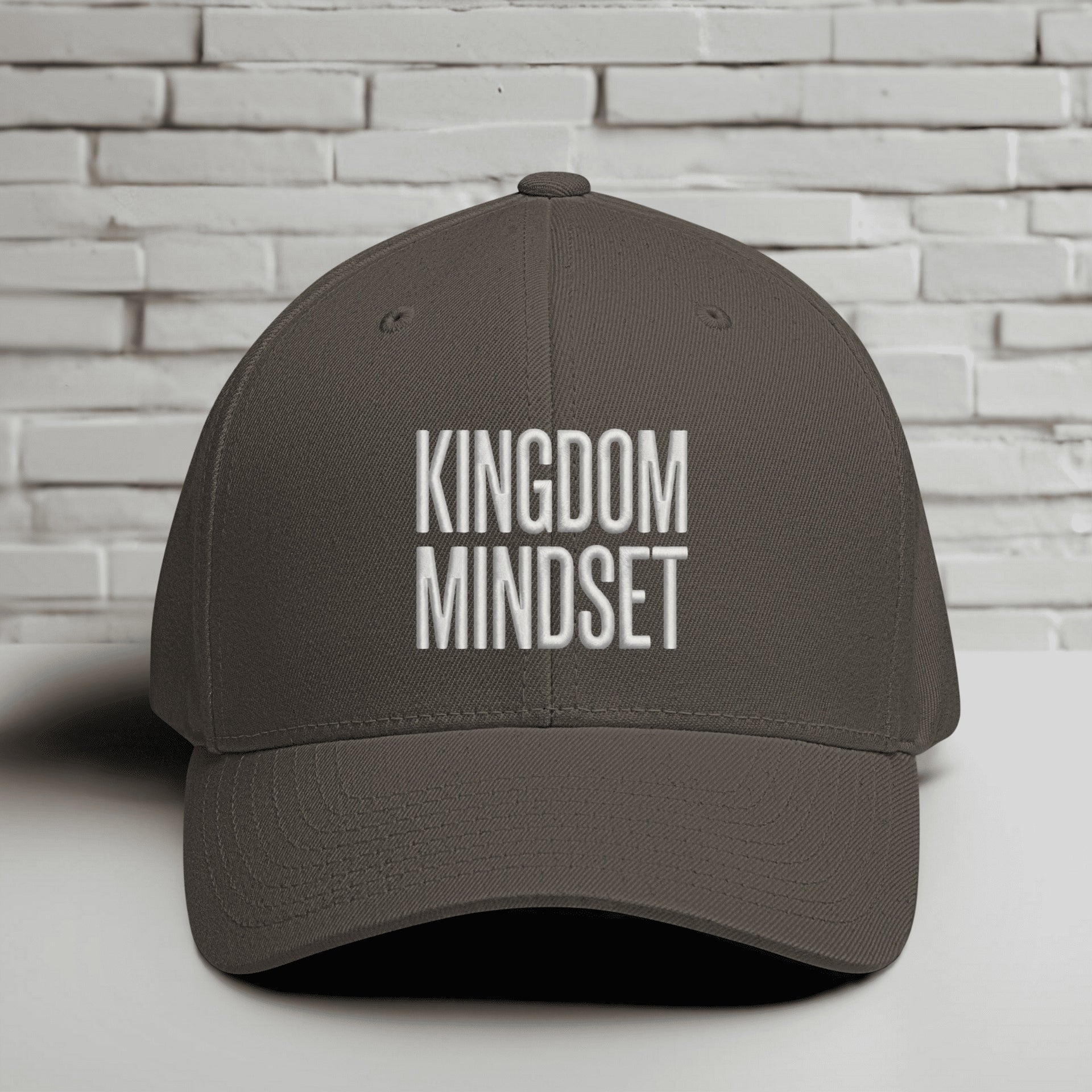 Kingdom Mindset Embroidered Flexfit Hat showcasing a stylish and meaningful design for believers.