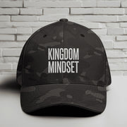 Front view of Kingdom Mindset Embroidered Flexfit Hat showcasing a stylish design on a dark background.