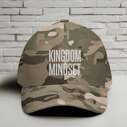 Kingdom Mindset Embroidered Flexfit Hat in camouflage design, showcasing faith and focus.