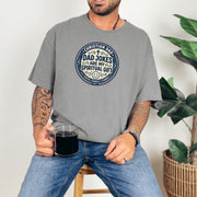 Christian Dad Jokes T Shirt worn by a man holding a cup, featuring a humorous design combining faith and dad humor.