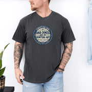 Man wearing Christian Dad Jokes T Shirt with graphic saying 'Dad Jokes Are My Spiritual Gift'.