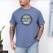 Man wearing a Christian Dad Jokes T Shirt with a humorous print, showcasing faith and fun.