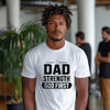 Dad Strength God First T-Shirt worn by a man in a casual setting, showcasing faith and strength in a graphic tee.