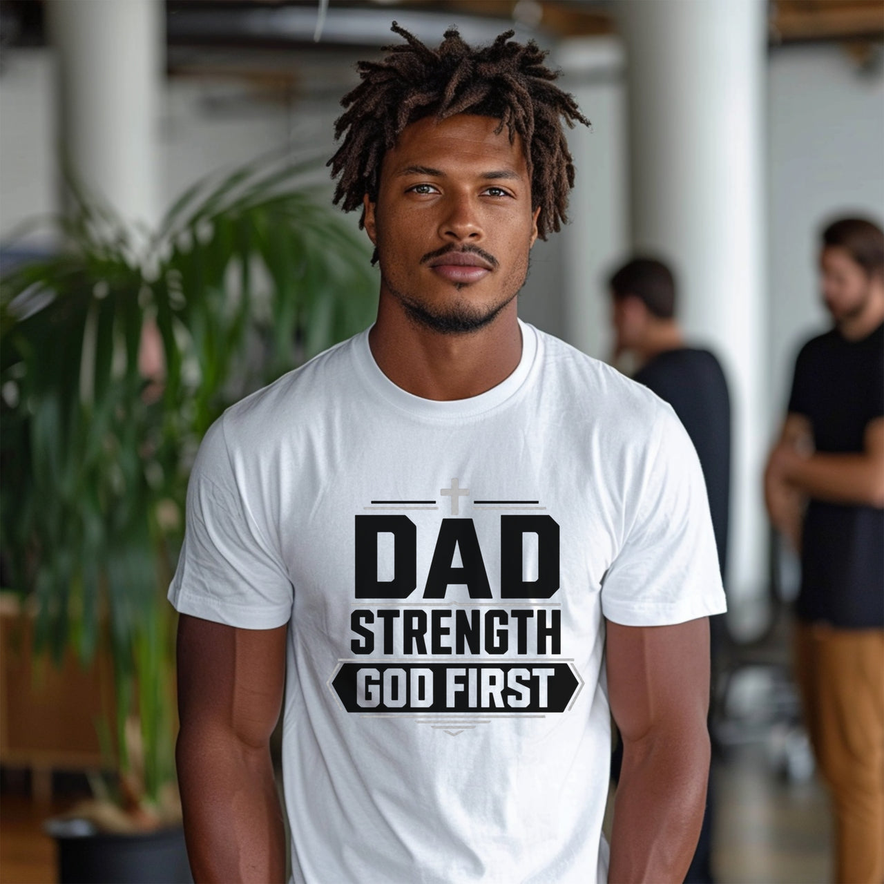 Dad Strength God First T-Shirt worn by a man in a casual setting, showcasing faith and strength in a graphic tee.